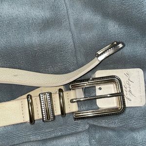 Free People S/M crème colored belt with silver and gold buckle. Never worn.